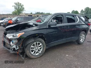 2021 Chevrolet Traverse LS with VIN 1GNERFKW8MJ174079, listed as a IAAI auction lot 42618437 with 66,541 mi miles and . Bid and sale history available at DreamBid. Image 2.