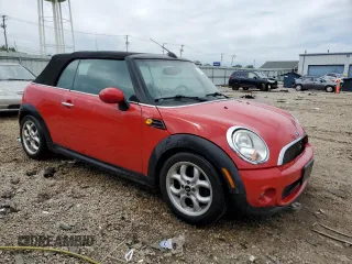 2012 MINI Convertible with VIN WMWZN3C58CT134224, listed as a Copart auction lot 57610015 with 141,394 mi miles and Salvage title. Bid and sale history available at DreamBid. Image 4.