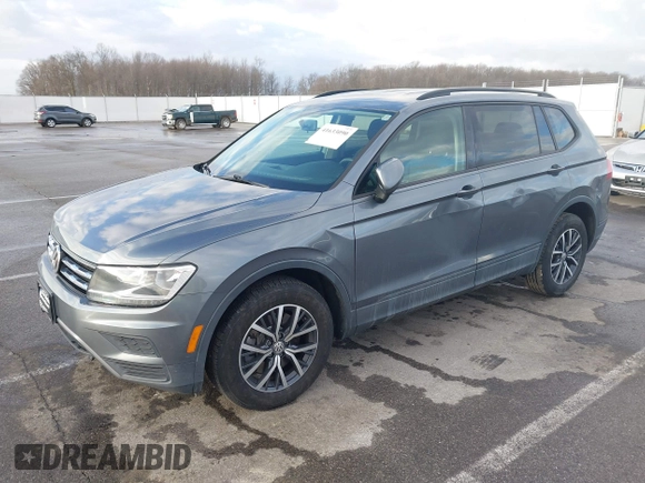2021 Volkswagen Tiguan S with VIN 3VV1B7AX8MM016874, listed as a IAAI auction lot 41633090 with 76,857 mi miles and . Bid and sale history available at DreamBid. Image 18.
