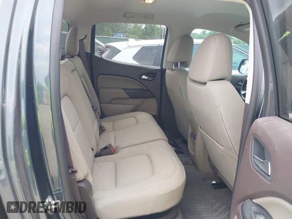 2019 GMC Canyon 4WD SLE z VIN 1GTG6CENXK1261278, wystawiony jako IAAI lot #42064295 z przebiegiem 51 786 mil mil oraz . Historia ofert i sprzedaży dostępna na DreamBid. Obrazek 8.
