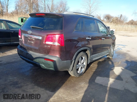 2012 Kia Sorento EX with VIN 5XYKUDA25CG239594, listed as a IAAI auction lot 41754946 with 135,005 mi miles. Bid and sale history available at carsss.com. Image 4.