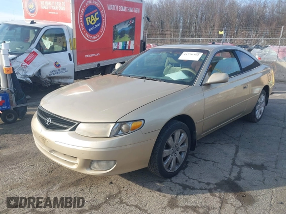 2000 Toyota Solara SE with VIN 2T1CG22P7YC303938, listed as a IAAI auction lot 41770102 with 163,137 mi miles. Bid and sale history available at carsss.com. Image 2.