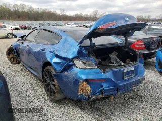 2020 BMW 8 Series M850i with VIN WBAGV8C03LCE29002, listed as a Copart auction lot 49397715 with Not provided miles and Salvage title. Bid and sale history available at DreamBid. Image 2.