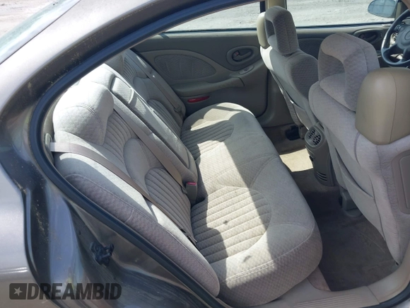 2001 Pontiac Bonneville SE z VIN 1G2HX54K514263686, wystawiony jako IAAI lot #42373637 z przebiegiem Nie podano mil oraz . Historia ofert i sprzedaży dostępna na DreamBid. Obrazek 8.