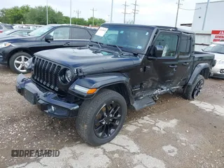 2023 Jeep Gladiator Overland with VIN 1C6HJTFG6PL555153, listed as a IAAI auction lot 42210878 with 40,576 mi miles and . Bid and sale history available at DreamBid. Image 18.