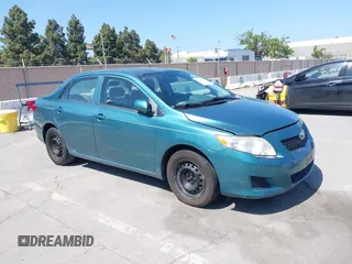 2009 Toyota Corolla with VIN 2T1BU40E29C159363, listed as a IAAI auction lot 42140431 with 147,477 mi miles. Bid and sale history available at carsss.com. Image 1.