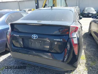 2017 Toyota Prius Two z VIN JTDKBRFU1H3047596, wystawiony jako IAAI lot #41868277 z przebiegiem 160 824 mil mil oraz . Historia ofert i sprzedaży dostępna na DreamBid. Obrazek 17.