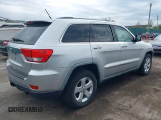 2011 Jeep Grand Cherokee Laredo with VIN 1J4RR4GG0BC622732, listed as a IAAI auction lot 42218785 with 127,186 mi miles and . Bid and sale history available at DreamBid. Image 4.