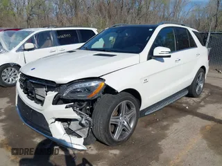 2015 Mercedes-Benz M 63 AMG with VIN 4JGDA7EB6FA471585, listed as a IAAI auction lot 41883006 with 39,243 mi miles and . Bid and sale history available at carsss.com. Image 2.