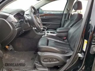 2015 Cadillac SRX Premium Collection z VIN 3GYFNDE33FS574125, wystawiony jako Copart lot #55530575 z przebiegiem 76 956 mil mil oraz Szkoda całkowita • Salvage title. Historia ofert i sprzedaży dostępna na DreamBid. Obrazek 7.