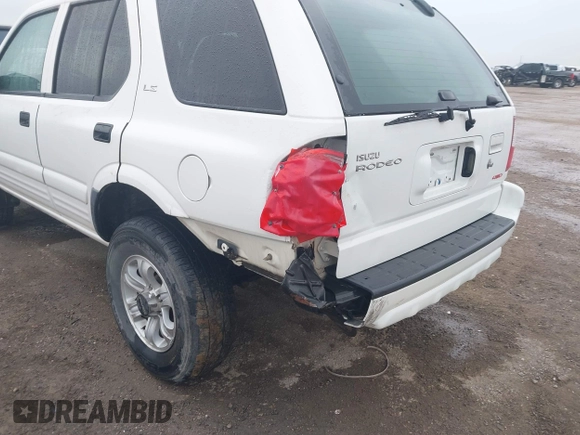 2001 Isuzu Rodeo S with VIN 4S2DM58WX14315138, listed as a IAAI auction lot 41535619 with 217,960 mi miles and . Bid and sale history available at DreamBid. Image 6.