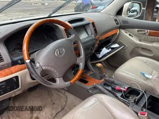 2006 Lexus GX 470 z VIN JTJBT20X960124511, wystawiony jako Copart lot #56307145 z przebiegiem 190 309 mil mil oraz Tytuł czysty. Historia ofert i sprzedaży dostępna na DreamBid. Obrazek 9.