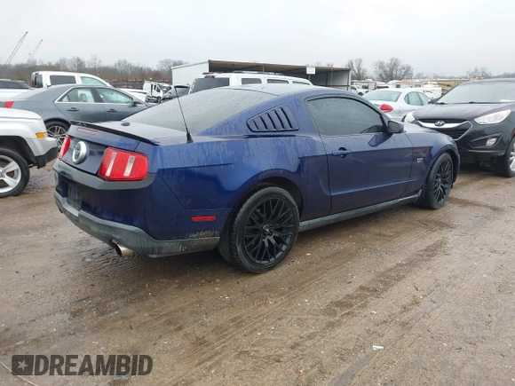 2010 Ford Mustang GT with VIN 1ZVBP8CH0A5121729, listed as a IAAI auction lot 41531080 with 162,673 mi miles. Bid and sale history available at carsss.com. Image 4.