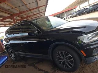 2018 Volkswagen Tiguan SEL z VIN 3VV3B7AX1JM036551, wystawiony jako IAAI lot #42170151 z przebiegiem 97 506 mil mil oraz . Historia ofert i sprzedaży dostępna na DreamBid. Obrazek 13.