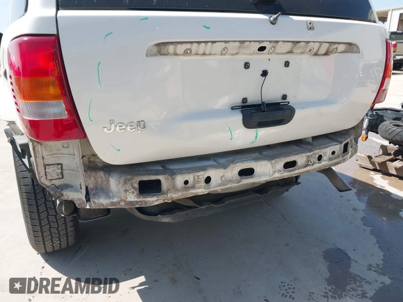 2003 Jeep Grand Cherokee Laredo with VIN 1J4GX48S43C518584, listed as a IAAI auction lot 42213094 with 163,743 mi miles and . Bid and sale history available at DreamBid. Image 6.