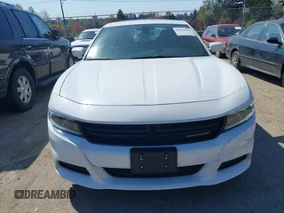 2022 Dodge Charger SXT with VIN 2C3CDXBG4NH197301, listed as a IAAI auction lot 42053688 with 60,592 mi miles and . Bid and sale history available at DreamBid. Image 12.