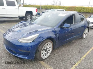 2023 Tesla Model 3 with VIN 5YJ3E1EA0PF518983, listed as a IAAI auction lot 41749225 with 26,748 mi miles and . Bid and sale history available at DreamBid. Image 2.