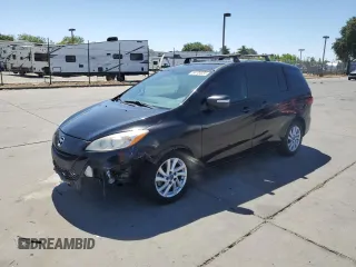 2015 Mazda 5 Sport with VIN JM1CW2BL9F0184913, listed as a Copart auction lot 64104555 with 128,511 mi miles and Salvage title. Bid and sale history available at DreamBid. Image 1.