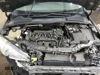 2016 Ford Focus SE z VIN 1FADP3F20GL305441, wystawiony jako Copart lot #55445105 z przebiegiem 117 033 mil mil oraz Szkoda całkowita • Salvage title. Historia ofert i sprzedaży dostępna na DreamBid. Obrazek 11.