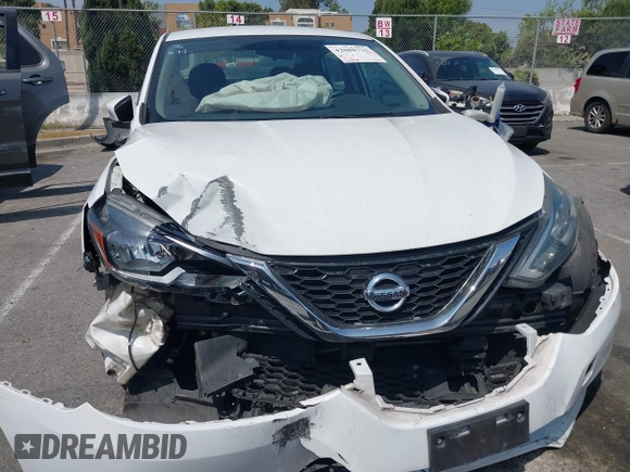 2018 Nissan Sentra S with VIN 3N1AB7AP6JY232812, listed as a IAAI auction lot 42088733 with 210,861 mi miles and . Bid and sale history available at DreamBid. Image 6.