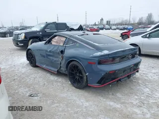 2024 Nissan Z Nismo with VIN JN1BZ4CH6RM360311, listed as a IAAI auction lot 41596881 with 8,916 mi miles and . Bid and sale history available at DreamBid. Image 3.