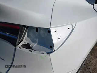 2023 Tesla Model Y Long Range z VIN 7SAYGDEE5PF765326, wystawiony jako IAAI lot #41757113 z przebiegiem 10 461 mil mil oraz . Historia ofert i sprzedaży dostępna na DreamBid. Obrazek 22.