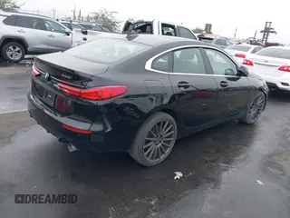 2021 BMW 2 Series 228i xDrive with VIN WBA73AK0XM7H43867, listed as a IAAI auction lot 41226556 with 30,767 mi miles and . Bid and sale history available at DreamBid. Image 4.