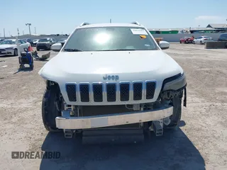 2019 Jeep Cherokee Latitude with VIN 1C4PJLCB9KD285111, listed as a IAAI auction lot 42044469 with 123,947 mi miles and . Bid and sale history available at DreamBid. Image 6.