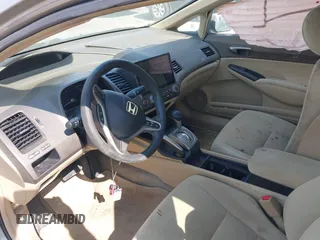 2006 Honda Civic LX with VIN 2HGFA16596H514483, listed as a IAAI auction lot 41889508 with 148,412 mi miles and . Bid and sale history available at DreamBid. Image 5.