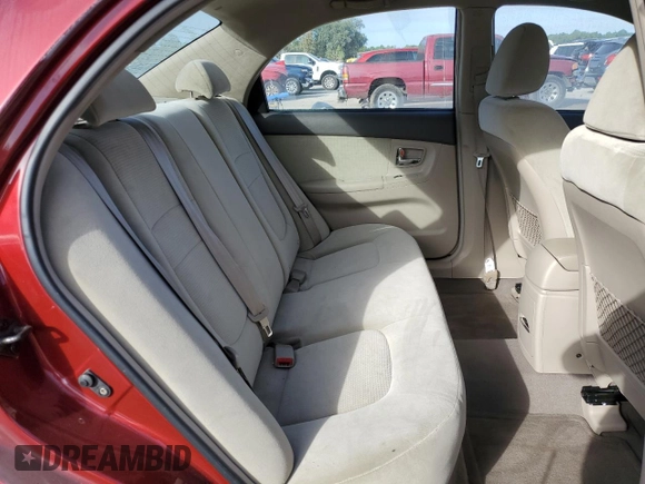 2007 Kia Spectra EX with VIN KNAFE121775427693, listed as a Copart auction lot 76727994 with 100,197 mi miles and Salvage Title. Bid and sale history available at carsss.com. Image 10.
