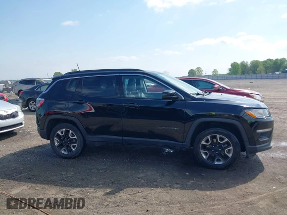 2021 Jeep Compass Altitude with VIN 3C4NJCBB0MT502423, listed as a IAAI auction lot 42006742 with 63,418 mi miles. Bid and sale history available at carsss.com. Image 13.