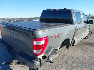 2021 Ford F-150 XL z VIN 1FTEW1EP3MKE33600, wystawiony jako IAAI lot #41053750 z przebiegiem 140 085 mil mil oraz . Historia ofert i sprzedaży dostępna na DreamBid. Obrazek 4.