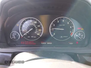 2012 BMW 7 Series 740i with VIN WBAKA4C58CDS99381, listed as a IAAI auction lot 41655715 with 112,731 mi miles and . Bid and sale history available at DreamBid. Image 7.