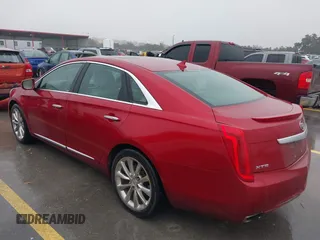 2013 Cadillac XTS Luxury with VIN 2G61P5S32D9115640, listed as a IAAI auction lot 41065284 with 125,643 mi miles and . Bid and sale history available at carsss.com. Image 3.