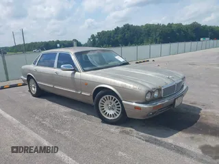 1996 Jaguar XJ Vanden Plas with VIN SAJKX6244TC784243, listed as a IAAI auction lot 42531272 with 71,967 mi miles and . Bid and sale history available at DreamBid. Image 1.