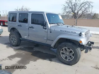 2018 Jeep Wrangler Unlimited Rubicon Recon z VIN 1C4HJWFG9JL840446, wystawiony jako IAAI lot #41804678 z przebiegiem 133 633 mil mil oraz . Historia ofert i sprzedaży dostępna na DreamBid. Obrazek 1.