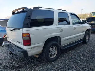 2003 Chevrolet Tahoe LS with VIN 1GNEC13Z83J321559, listed as a IAAI auction lot 41461500 with 180,756 mi miles. Bid and sale history available at carsss.com. Image 4.