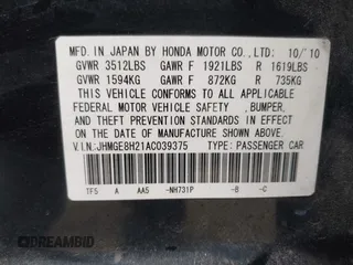 2010 Honda Fit with VIN JHMGE8H21AC039375, listed as a IAAI auction lot 42126138 with 123,077 mi miles. Bid and sale history available at carsss.com. Image 9.