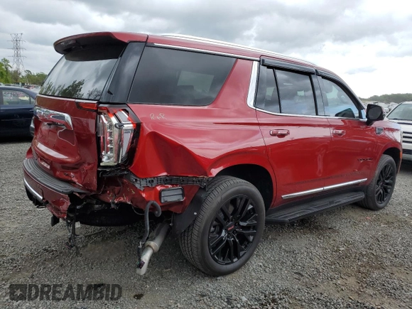 2023 GMC Yukon SLT with VIN 1GKS2BKD5PR410284, listed as a Copart auction lot 49705495 with 7,045 mi miles and Salvage Title. Bid and sale history available at carsss.com. Image 3.
