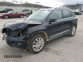2012 Volkswagen Tiguan SE z VIN WVGAV7AXXCW531875, wystawiony jako Copart lot #82137824 z przebiegiem 147 210 mil mil oraz Tytuł czysty. Historia ofert i sprzedaży dostępna na DreamBid. Obrazek 1.