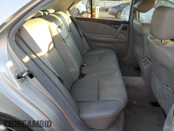 1999 Mercedes-Benz E 320 with VIN WDBJF65H8XA734585, listed as a Copart auction lot 79141194 with 196,908 mi miles and Salvage Title. Bid and sale history available at DreamBid. Image 10.
