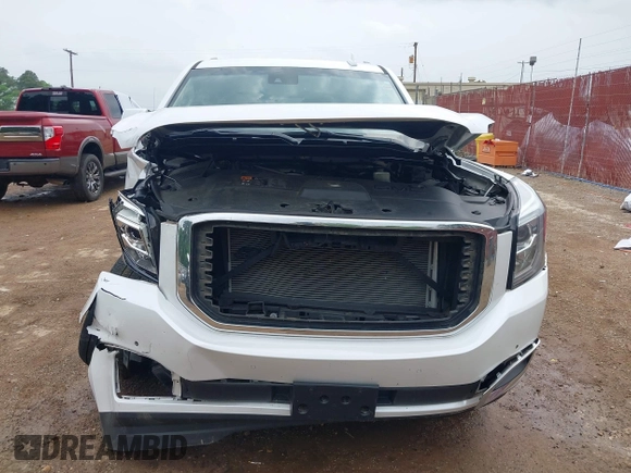 2016 GMC Yukon Denali with VIN 1GKS1CKJ7GR237852, listed as a IAAI auction lot 41944398 with 65,703 mi miles. Bid and sale history available at carsss.com. Image 13.