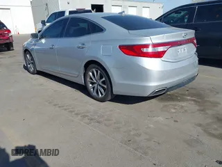 2015 Hyundai Azera z VIN KMHFG4JG0FA453994, wystawiony jako IAAI lot #42002922 z przebiegiem 102 094 mil mil oraz . Historia ofert i sprzedaży dostępna na DreamBid. Obrazek 3.