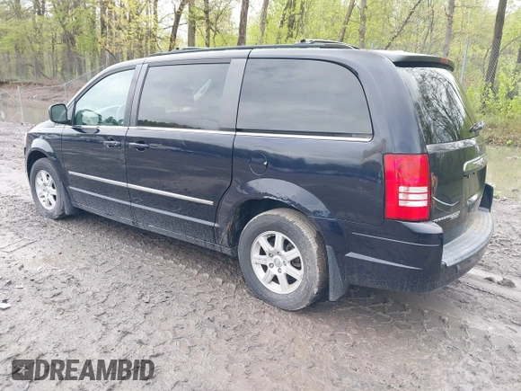 2010 Chrysler Town & Country Touring with VIN 2A4RR5D15AR170014, listed as a IAAI auction lot 42202810 with 199,557 mi miles and . Bid and sale history available at DreamBid. Image 3.