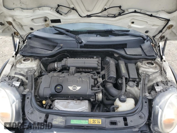 2010 MINI Convertible with VIN WMWMR3C52ATU96951, listed as a Copart auction lot 82038804 with 120,199 mi miles and Clean Title. Bid and sale history available at DreamBid. Image 12.