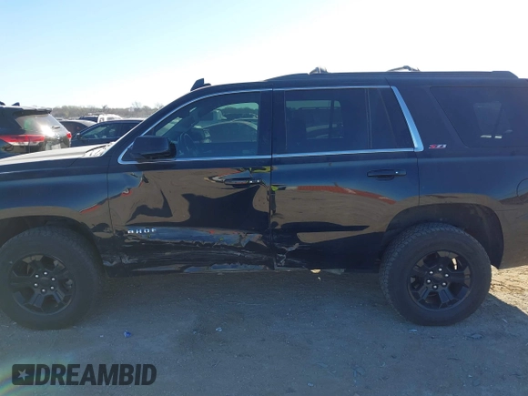 2017 Chevrolet Tahoe LT with VIN 1GNSKBKC6HR394138, listed as a IAAI auction lot 41852966 with 130,711 mi miles and . Bid and sale history available at DreamBid. Image 14.