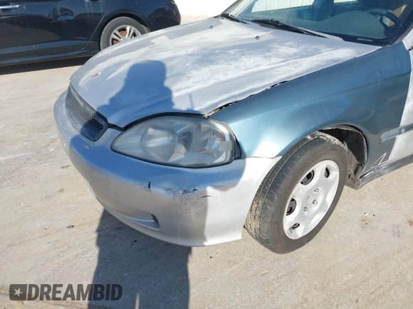 1999 Honda Civic LX with VIN 2HGEJ6678XH581295, listed as a IAAI auction lot 41550824 with 152,277 mi miles and . Bid and sale history available at DreamBid. Image 6.