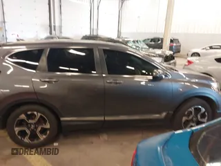 2018 Honda CR-V Touring with VIN 2HKRW2H91JH634457, listed as a IAAI auction lot 41697658 with 101,878 mi miles. Bid and sale history available at carsss.com. Image 14.