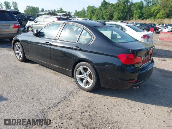 2014 BMW 3 Series 328i xDrive with VIN WBA3B5G56ENS06890, listed as a IAAI auction lot 42168982 with 133,664 mi miles. Bid and sale history available at carsss.com. Image 3.