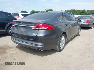2018 Ford Fusion SE with VIN 3FA6P0HD8JR277127, listed as a IAAI auction lot 42040109 with 118,795 mi miles. Bid and sale history available at carsss.com. Image 4.